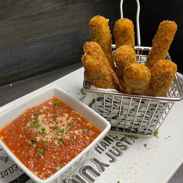 Golden Mozzarella Sticks: A Sports Bar Favorite
